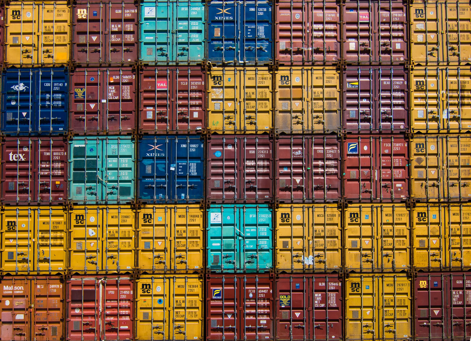 a wall of shipping containers